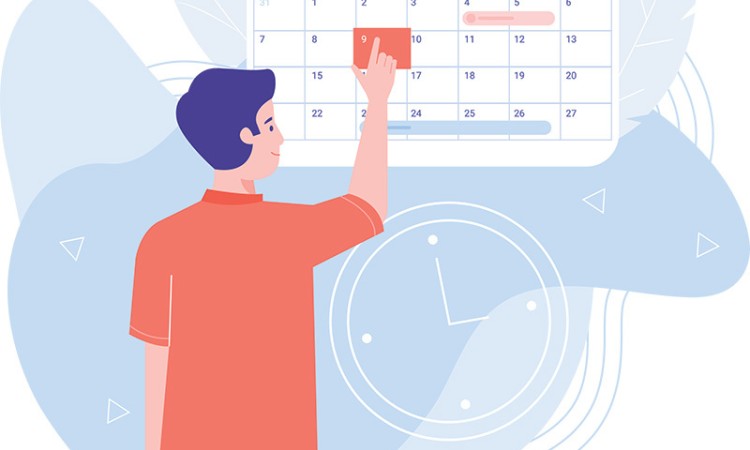 Person looking at calendar to plan next hearing care appointment