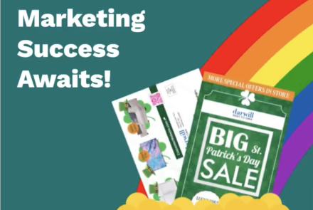 Pot of gold at the end of the rainbow with sample marketing mail popping out of the pot.